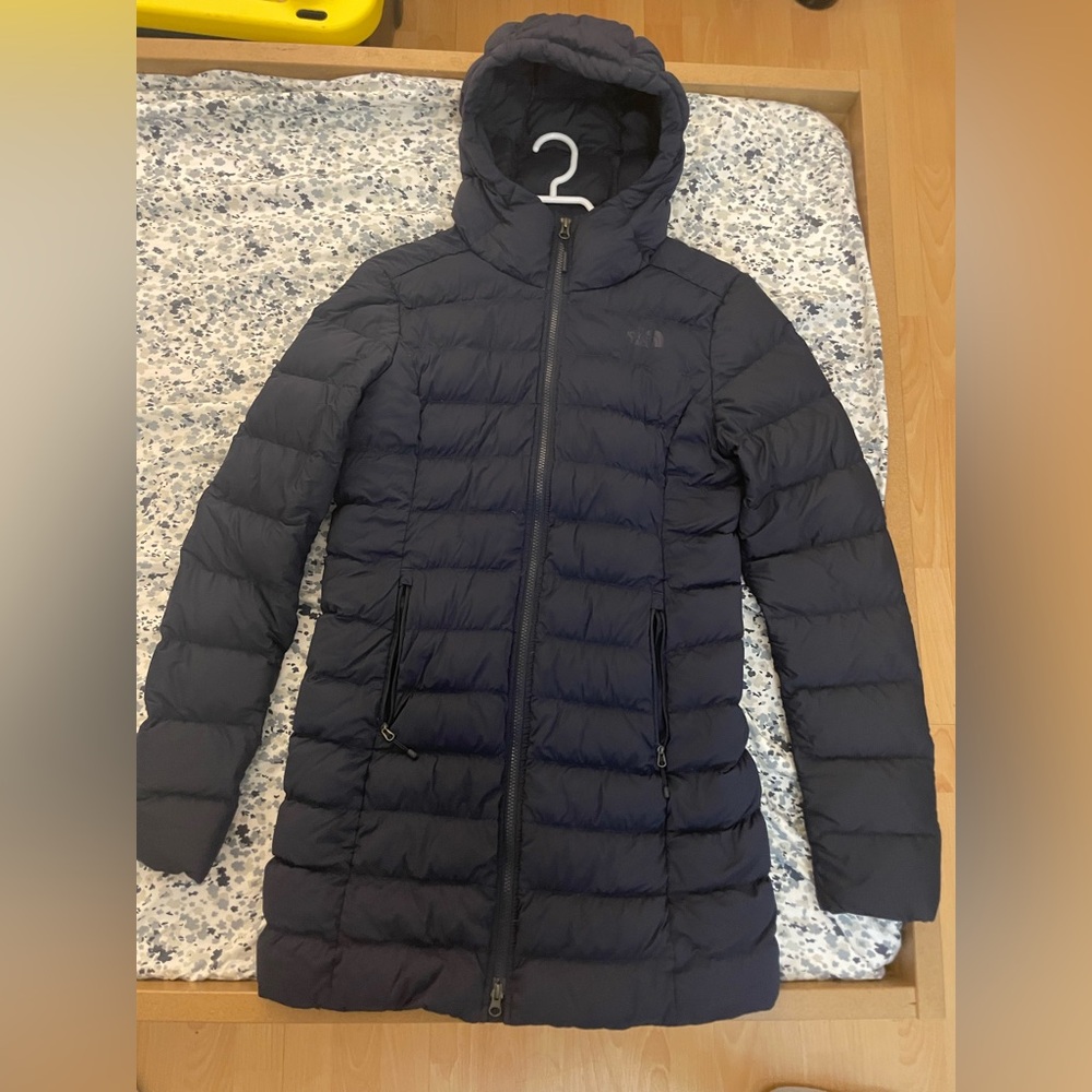 The North Face down Jacket in navy blue.
